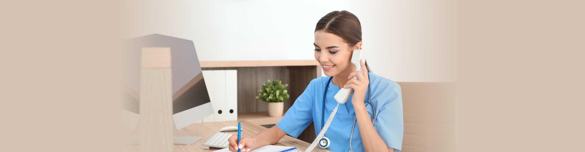 Female medical assistant at workplace in clinic. Health care service